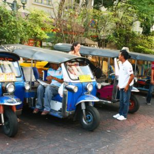 while-tuk-tuks-line-up-to-take-pedestrians-around-the-city