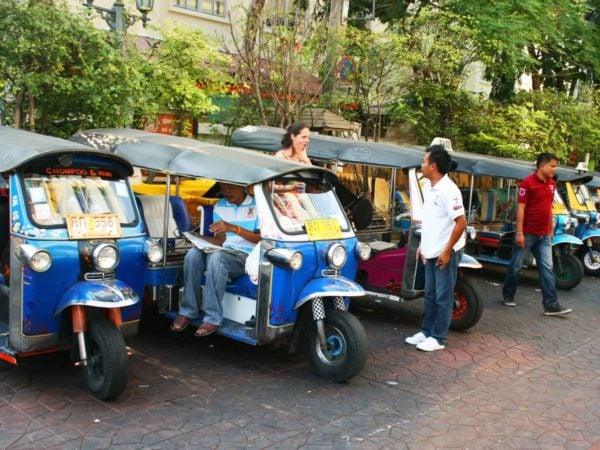 while-tuk-tuks-line-up-to-take-pedestrians-around-the-city